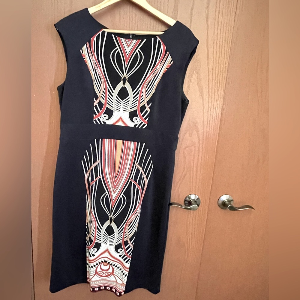 Cleo Size 14 Black with a multi coloured centre of dress. Midi length.